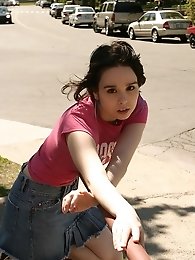 Cute teen model poses in street