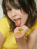 cute teen eats candy naked