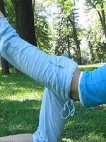 pretty blonde teen girl christine young posing in a park