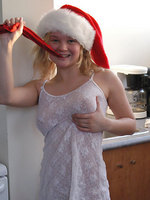 titty-flashing blonde teen cutie in a christmas outfit