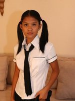 cute kat young strips wearing a school girl uniform