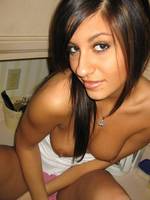 raven does a little striptease on the kitchen counter