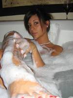 sexy babe taking a hot bubble bath